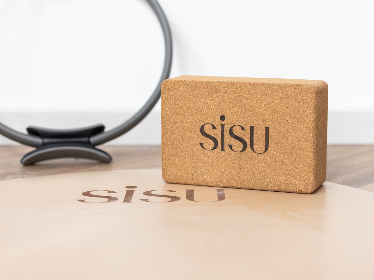 A SiSU cork block and magic circle on a mat in the mat studio