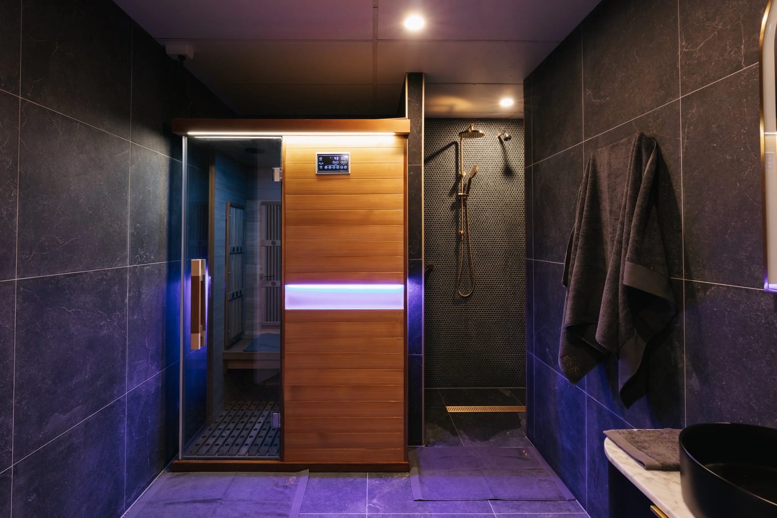 The SiSU infrared sauna room, with the shower beside it